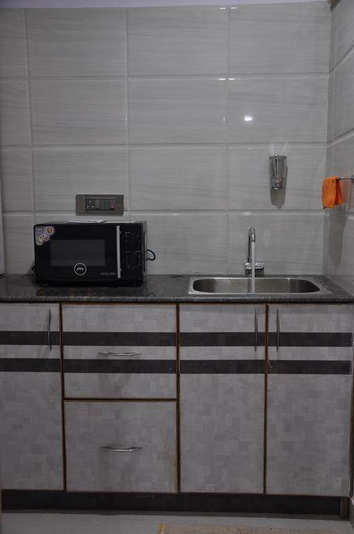 Hotel Av Comforts Bengalúr Pokoj fotografie
